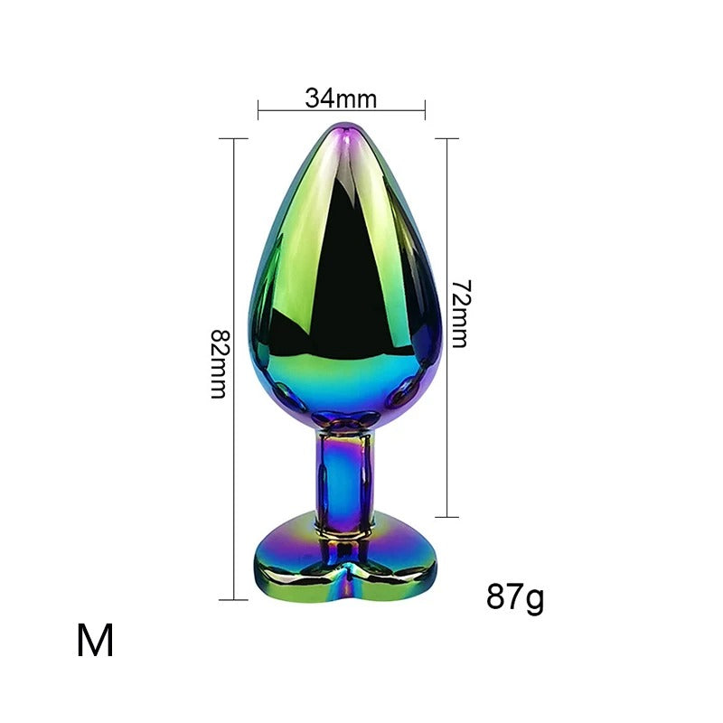 Plug Anal Tornasol Metálico con Joya en Forma de Corazón – Elegancia y Placer en Cada Detalle